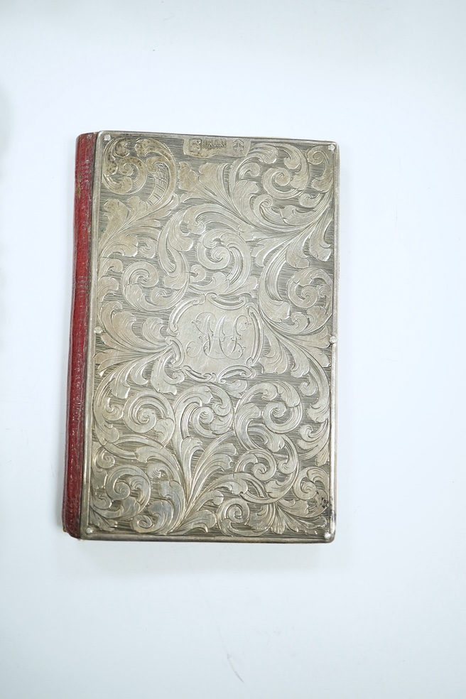 A Victorian silver card case engraved with a heron, maker Nathaniel Mills, Birmingham 1843, in original leather case, another Nathaniel Mills case with foliate scroll engraving, Birmingham 1840, and a silver mounted leat